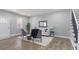 Bright living room with hardwood floors, lots of light, and stylish furniture, including a sofa and accent chairs at 2326 Guilford Ave, Indianapolis, IN 46205