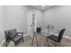Bright office space with a glass desk, modern chair, and neutral decor at 2326 Guilford Ave, Indianapolis, IN 46205