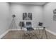 Office featuring a glass desk with metal legs, carpet flooring, and modern decor at 2326 Guilford Ave, Indianapolis, IN 46205