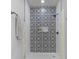 Luxurious shower with patterned tile and black fixtures at 2326 Guilford Ave, Indianapolis, IN 46205