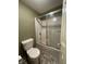 Bathroom featuring toilet, shower with sliding glass door, and neutral color tones at 2365 E 850 N, Lebanon, IN 46052