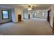 Spacious bonus room featuring multiple windows and ceiling fans, offering natural light at 2365 E 850 N, Lebanon, IN 46052