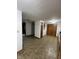 Unfurnished room with laundry hookups, closet space, tile flooring and access to other rooms at 2365 E 850 N, Lebanon, IN 46052