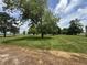Expansive lawn with mature trees and blue sky at 2365 E 850 N, Lebanon, IN 46052