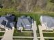 Aerial view of multiple homes showcasing large manicured backyards in a residential community at 2798 W High Grove Cir, Zionsville, IN 46077