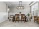 Charming dining room with modern light fixture and neutral color palette at 2798 W High Grove Cir, Zionsville, IN 46077