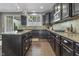 Spacious kitchen featuring granite countertops, stainless steel appliances, tile backsplash, and a bright window at 2798 W High Grove Cir, Zionsville, IN 46077