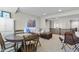 Cozy living room area with a round table and comfortable seating, great for entertaining and relaxation at 2798 W High Grove Cir, Zionsville, IN 46077