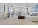 Spacious carpeted loft with ample seating, natural light, and versatile layout at 2798 W High Grove Cir, Zionsville, IN 46077