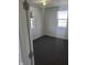 An empty bedroom featuring neutral walls, carpet and dual windows for natural light at 2801 Brouse Ave, Indianapolis, IN 46218