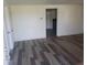 Bright living room featuring stylish wood floors and neutral wall colors, ready for personalization at 2801 Brouse Ave, Indianapolis, IN 46218