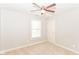 Bedroom with a ceiling fan, plush carpet, and natural light at 2945 N New Jersey St, Indianapolis, IN 46205