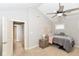 Relaxing bedroom with a ceiling fan, plush carpet, and natural light at 2945 N New Jersey St, Indianapolis, IN 46205
