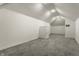 Finished attic featuring carpet flooring, white walls, and recessed lighting, ready for customization at 3133 Ruckle St, Indianapolis, IN 46205