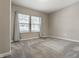 Bedroom with soft carpet, neutral walls, and dual windows with sheer curtains for a bright space at 3133 Ruckle St, Indianapolis, IN 46205