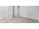 Comfortable bedroom offers plush carpet and ample closet space, perfect for a relaxing retreat at 338 S Roena St, Indianapolis, IN 46241