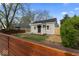 Charming single-story home with new gray siding, black roof, and a cozy front porch at 338 S Roena St, Indianapolis, IN 46241