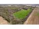 Expansive aerial view reveals the property's vast acreage and beautiful surroundings at 3718 S County Road 101 E, Clayton, IN 46118