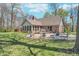 Outdoor patio area perfect for entertaining, featuring seating and a tranquil view of the backyard at 3718 S County Road 101 E, Clayton, IN 46118