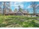 A spacious backyard with manicured lawn and patio, perfect for outdoor entertaining and relaxation at 3718 S County Road 101 E, Clayton, IN 46118