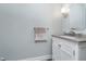 Bathroom featuring a vanity with a stone countertop, modern fixtures, and a towel bar at 3718 S County Road 101 E, Clayton, IN 46118
