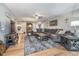 Inviting living room with hardwood floors, a large sectional, and stylish decor at 3718 S County Road 101 E, Clayton, IN 46118