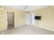 Comfortable bedroom with painted walls, doors to closets, and ceiling fan at 3748 Bay Rd S Dr, Indianapolis, IN 46240