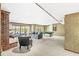 Large open living space with fireplace and lake view; perfect for entertaining friends and Gathering at 3748 Bay Rd S Dr, Indianapolis, IN 46240