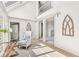Open and airy hallway with unique architectural accents and views of other rooms at 3748 Bay Rd S Dr, Indianapolis, IN 46240