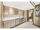 The wet bar has ample storage and countertop space, perfect for entertaining at 3748 Bay Rd S Dr, Indianapolis, IN 46240