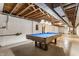 Recreational area in unfinished basement with a pool table at 3959 N Grant Ave, Indianapolis, IN 46226