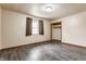This bedroom has an open closet, hardwood floors, and a window with natural light, creating a comfortable space at 3959 N Grant Ave, Indianapolis, IN 46226