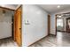 The home's hallway features hardwood floors and access to multiple rooms, showcasing the floor plan's connectivity at 3959 N Grant Ave, Indianapolis, IN 46226