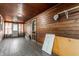 Cozy sunroom with natural wood paneling, a door to the outside, and a relaxing atmosphere at 3959 N Grant Ave, Indianapolis, IN 46226