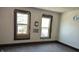 Bedroom with two windows and graffiti on the wall at 437 Jefferson Ave, Indianapolis, IN 46201
