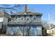 View of the back of a two-story house featuring blue siding and several windows at 437 Jefferson Ave, Indianapolis, IN 46201
