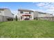 View of a spacious backyard with a patio featuring a gazebo and well-maintained lawn at 4417 Barharbor Ct, Indianapolis, IN 46268