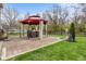 Spacious backyard featuring a brick patio with gazebo perfect for relaxing and entertaining guests at 4417 Barharbor Ct, Indianapolis, IN 46268