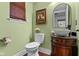 Charming powder room with a unique vessel sink, granite counter, and classic fixtures at 4417 Barharbor Ct, Indianapolis, IN 46268