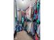 Organized walk-in closet with ample hanging space and a variety of clothing items at 4417 Barharbor Ct, Indianapolis, IN 46268