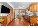 Spacious kitchen with wood floors, stainless steel appliances, and granite countertops at 4417 Barharbor Ct, Indianapolis, IN 46268