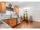 Elegant kitchen featuring granite counters, stainless steel appliances, and classic décor at 4417 Barharbor Ct, Indianapolis, IN 46268