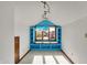 Attic bedroom featuring a window nook with seating and shelving at 4606 Sundance Trl, Indianapolis, IN 46239