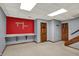Finished basement featuring desk, game area, and access doors at 4606 Sundance Trl, Indianapolis, IN 46239