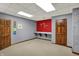 Finished basement featuring game area, workspace with built-in desk and panel doors at 4606 Sundance Trl, Indianapolis, IN 46239