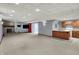 Open basement design with combined living room, dining area, and kitchen space at 4606 Sundance Trl, Indianapolis, IN 46239