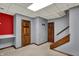 Finished basement with carpeted floor, staircase and paneled doors at 4606 Sundance Trl, Indianapolis, IN 46239