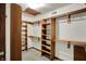 Walk-in closet with custom shelving and ample storage space at 4606 Sundance Trl, Indianapolis, IN 46239