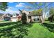 Two-story brick home featuring an attached two-car garage and well-manicured lawn at 4606 Sundance Trl, Indianapolis, IN 46239