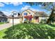 Two-story brick home featuring an attached two-car garage and well-manicured lawn at 4606 Sundance Trl, Indianapolis, IN 46239